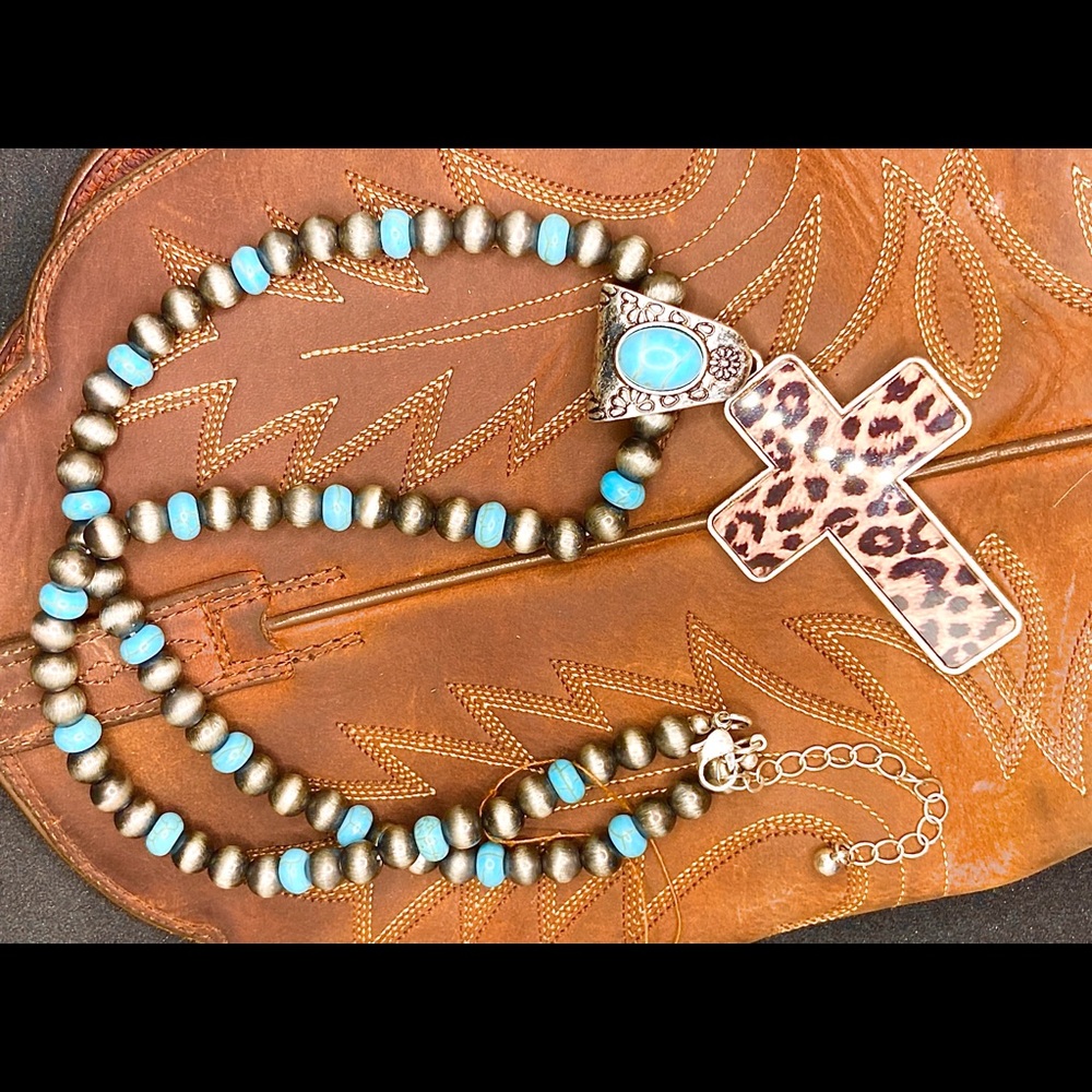 CHEETAH PRINT CROSS NECKLACE